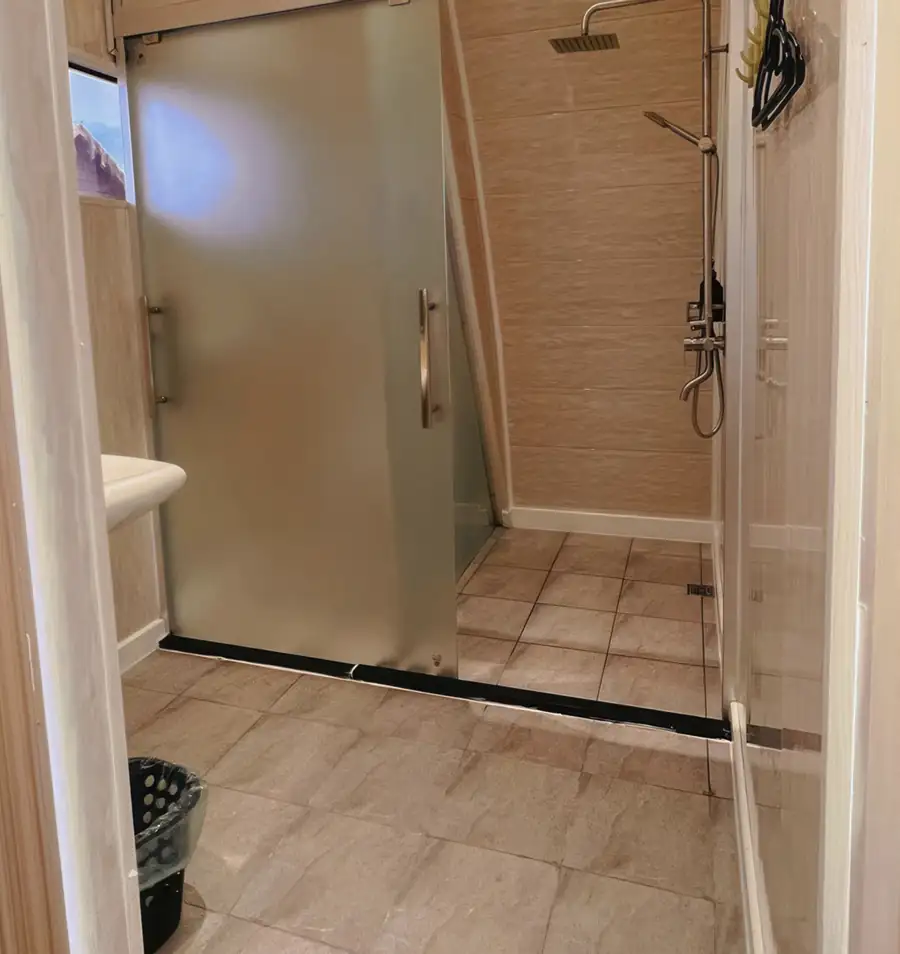 A practical simple bathroom at Crystal Resort, an over the water resort near Semporna