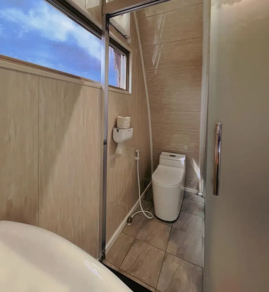 A bright simple bathroom at Crystal Resort, a water resort near the Tun Sakaran Marine Park